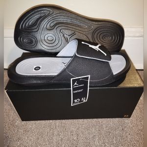 Jordan Slids size 10 black and white also Gray and white size 9's ask about